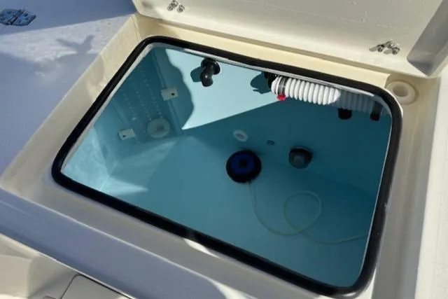 Slide: The Image of Open storage compartment in 2025 Pathfinder 2500 Hybrid boat. - 15