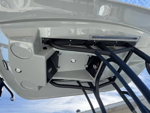 Slide: The Image of 2025 Pathfinder 2500 Hybrid boat's underside view with sleek design and sturdy framework. - 22