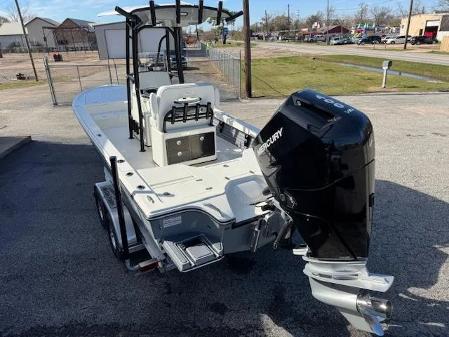 Slide: The Image of 2025 Pathfinder 2500 Hybrid boat with Mercury outboard engine on a trailer. - 4