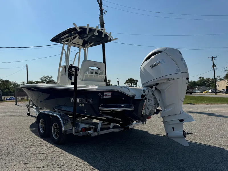 Slide: The Image of 2025 Pathfinder 2500 Hybrid boat on trailer with Yamaha outboard motor. - 20
