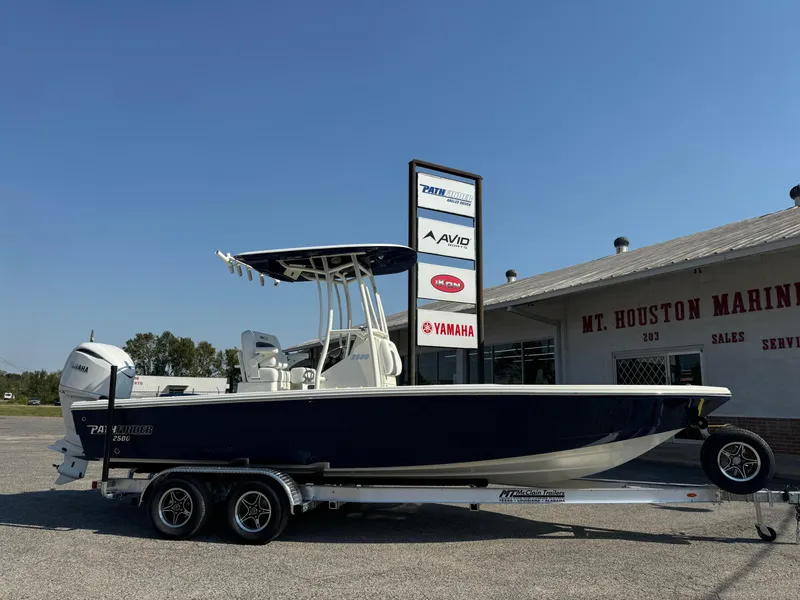 Slide: The Image of 2025 Pathfinder 2500 Hybrid boat on trailer at Mt. Houston Marine dealership. - 21