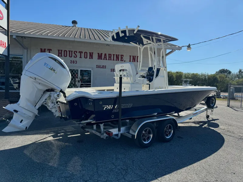 Slide: The Image of 2025 Pathfinder 2500 Hybrid boat on trailer at Mt. Houston Marine dealership. - 3