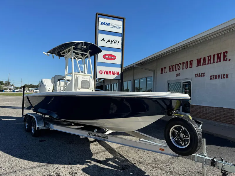 Slide: The Image of 2025 Pathfinder 2500 Hybrid boat on trailer at Mt. Houston Marine dealership. - 4