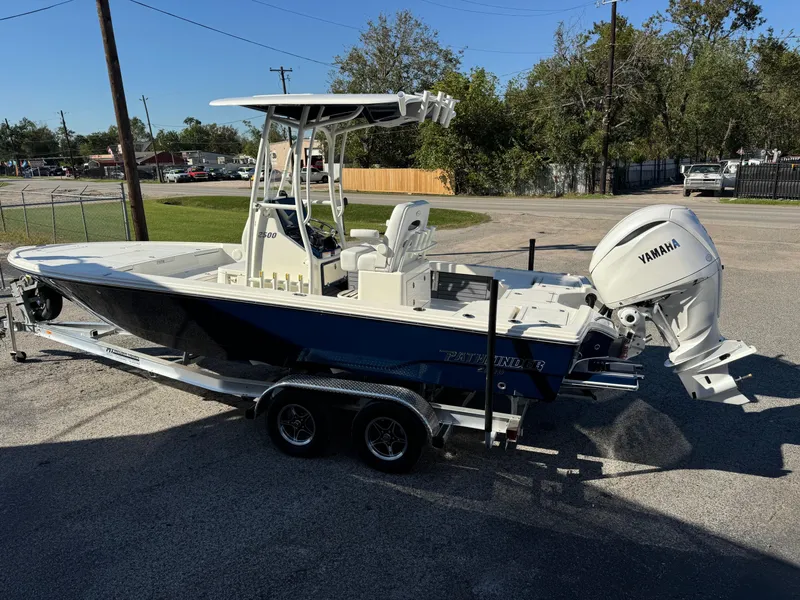 Slide: The Image of 2025 Pathfinder 2500 Hybrid boat on trailer with Yamaha outboard motor. - 5