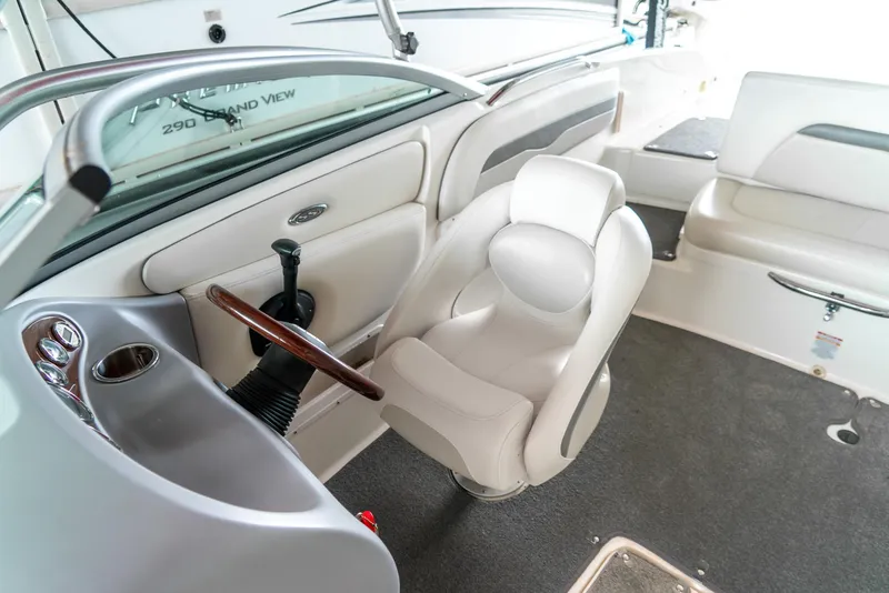 Slide: The Image of Interior of 2006 Chaparral 220 SSi boat with steering wheel and seating. - 17