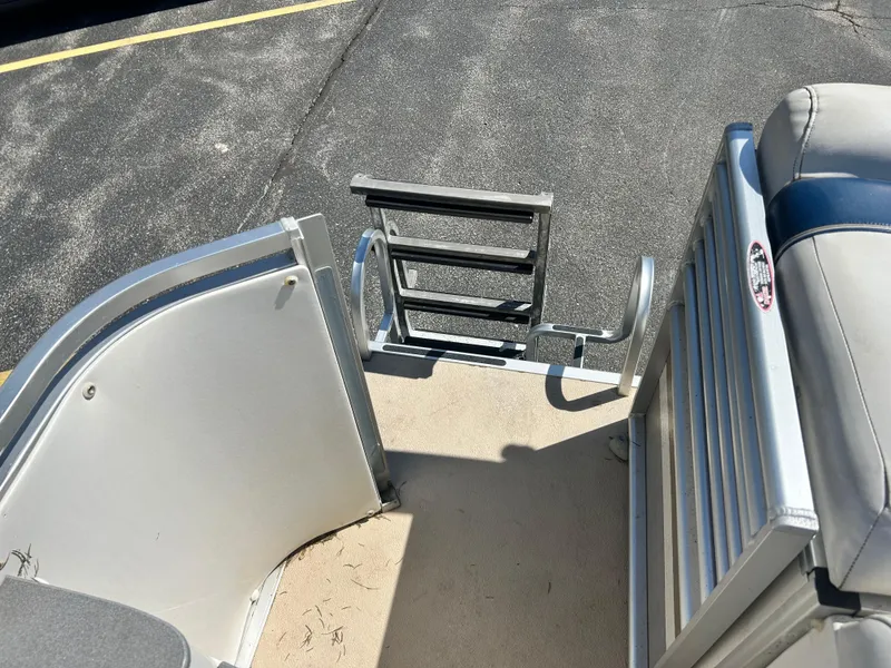 Slide: The Image of 2006 Harris 230 Royal Heritage boat ladder and deck view. - 16