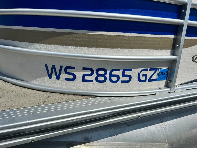 Slide: The Image of 2006 Harris 230 Royal Heritage boat with registration WS 2865 GZ, blue and beige exterior. - 18