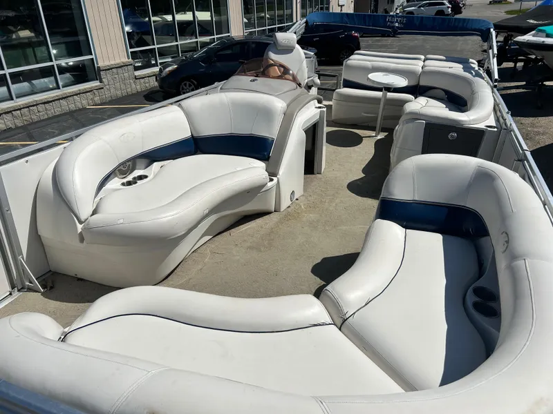 Slide: The Image of 2006 Harris 230 Royal Heritage pontoon boat with spacious seating and modern design. - 6