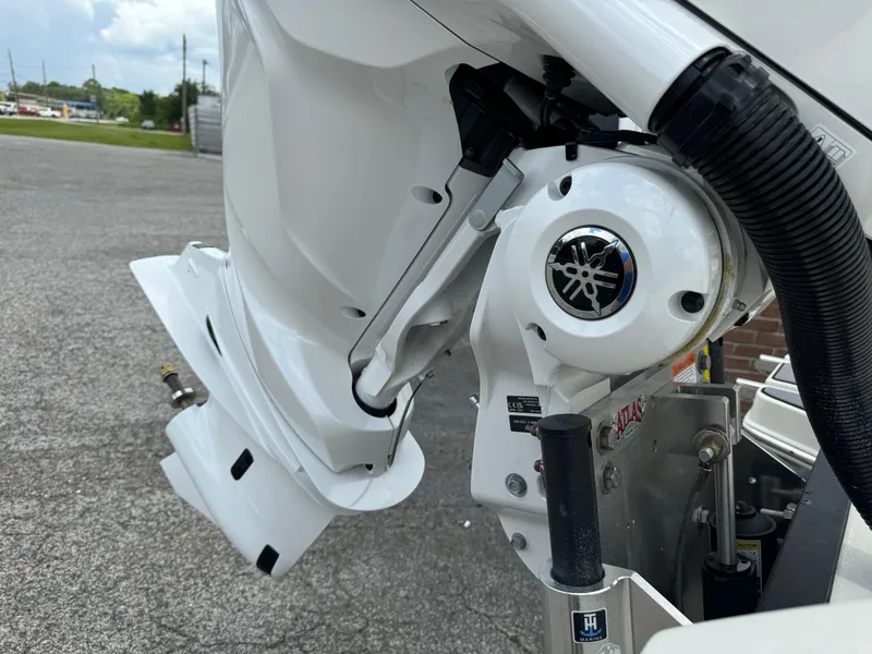 Slide: The Image of 2024 Pathfinder 2600 HPS boat engine detail with Yamaha logo, outdoor setting. - 13