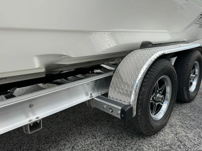Slide: The Image of 2024 Pathfinder 2600 HPS boat trailer with dual wheels and diamond plate fender. - 15