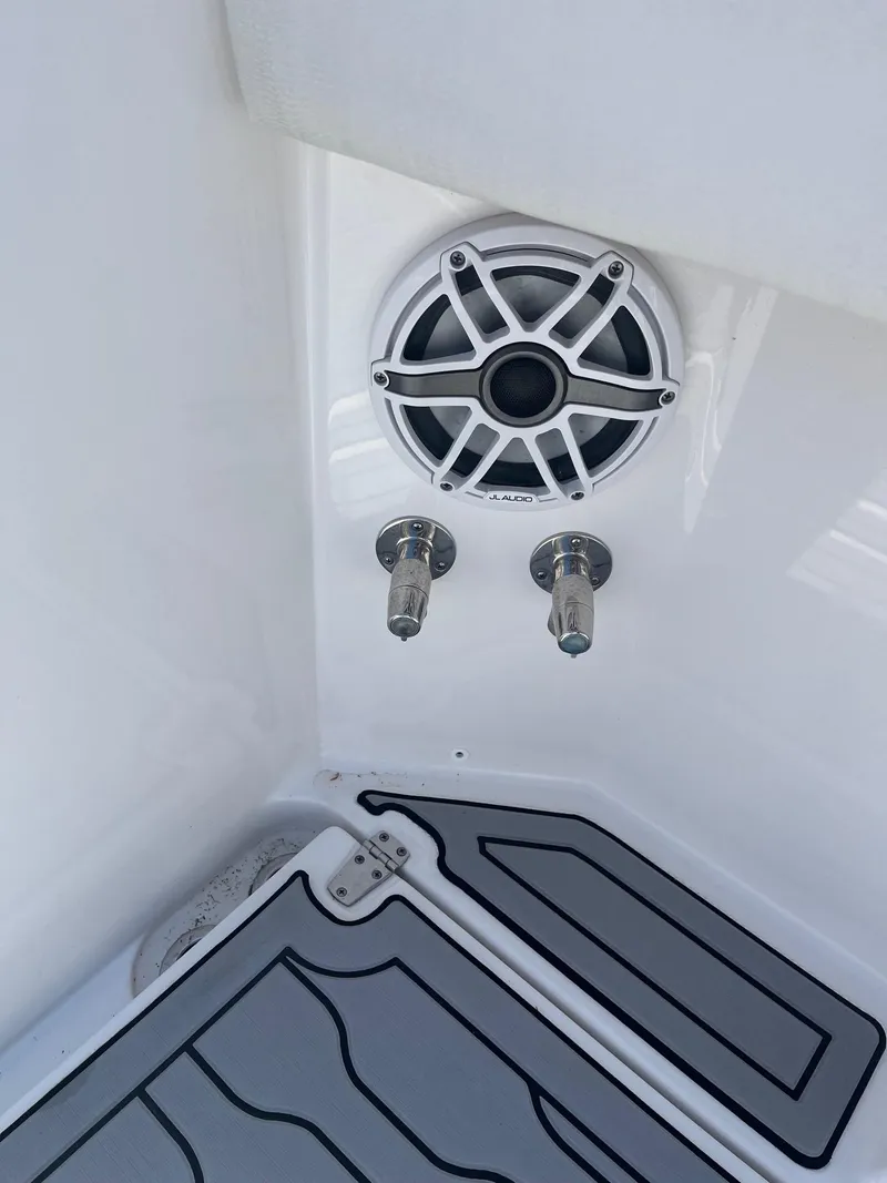 Slide: The Image of Edgewater 340CC 2021 boat interior with speaker and fixtures. - 5