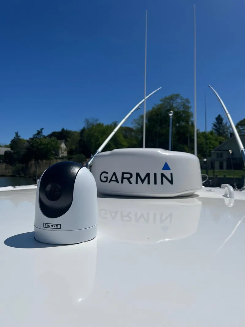 Slide: The Image of Edgewater 340CC 2021 boat with Garmin radar and camera on deck. - 7