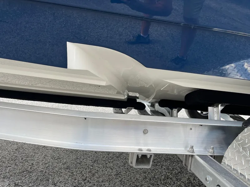 Slide: The Image of 2025 Pathfinder 2400 Open boat on trailer, showcasing hull and trailer details. - 15