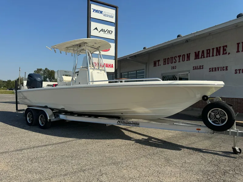 Slide: The Image of 2025 Pathfinder 2600 TRS boat on trailer at Mt. Houston Marine dealership. - 1