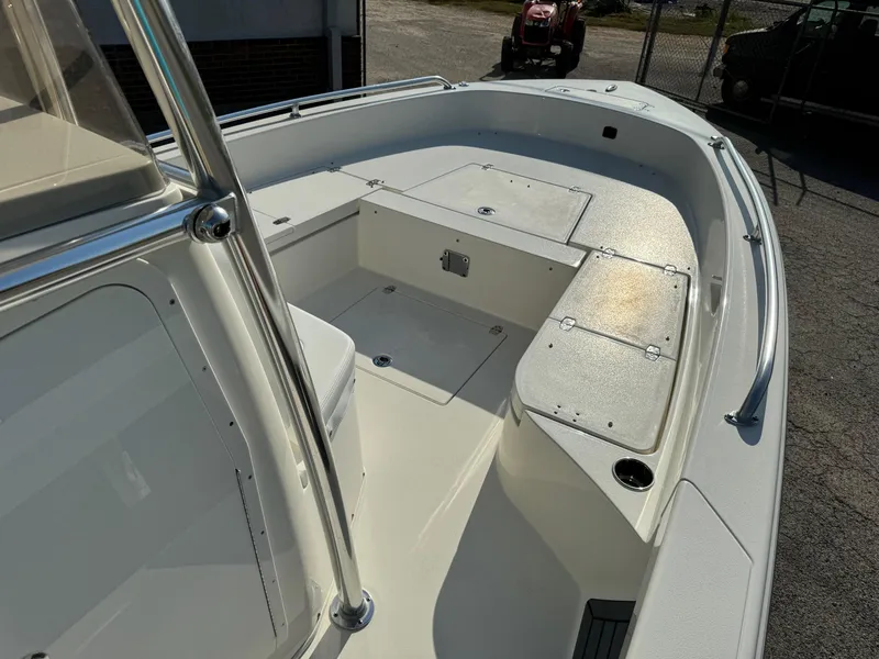 Slide: The Image of 2025 Pathfinder 2600 TRS boat interior with spacious seating and storage compartments. - 11