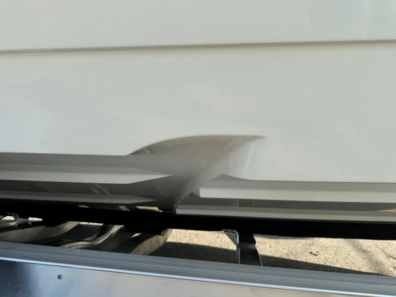 Slide: The Image of 2025 Pathfinder 2600 TRS boat hull detail on trailer. - 16