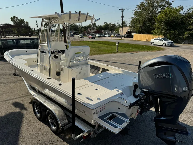 Slide: The Image of 2025 Pathfinder 2600 TRS boat on trailer with Yamaha outboard motor. - 3