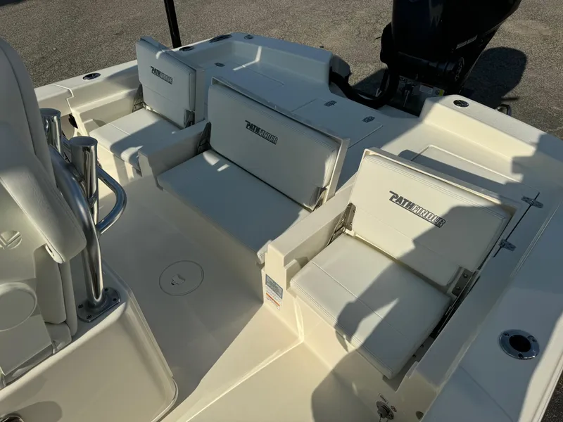 Slide: The Image of 2025 Pathfinder 2600 TRS boat interior with cushioned seating and sleek design. - 6