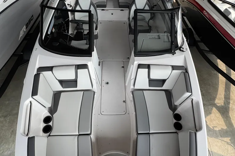 Slide: The Image of 2025 Yamaha Boats SX220 interior with modern seating and sleek design. - 3