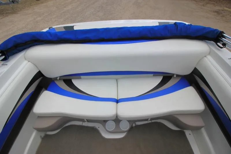 Slide: The Image of 2003 Glastron SX 175 boat interior with blue and white seating. - 12