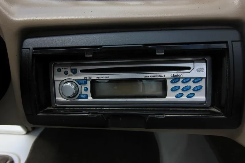 Slide: The Image of Clarion stereo system in 2003 Glastron SX 175 boat dashboard. - 15