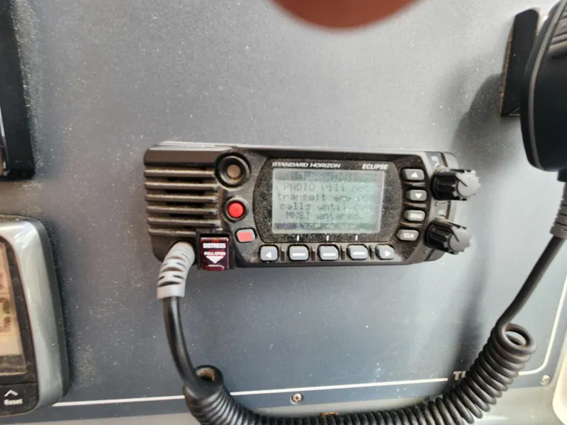 Slide: The Image of VHF marine radio on 2001 Tiara Yachts 3100 Open dashboard. - 20