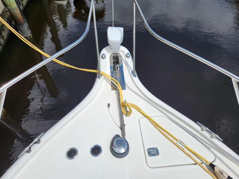 Slide: The Image of Bow view of 2001 Tiara Yachts 3100 Open with anchor and ropes. - 34