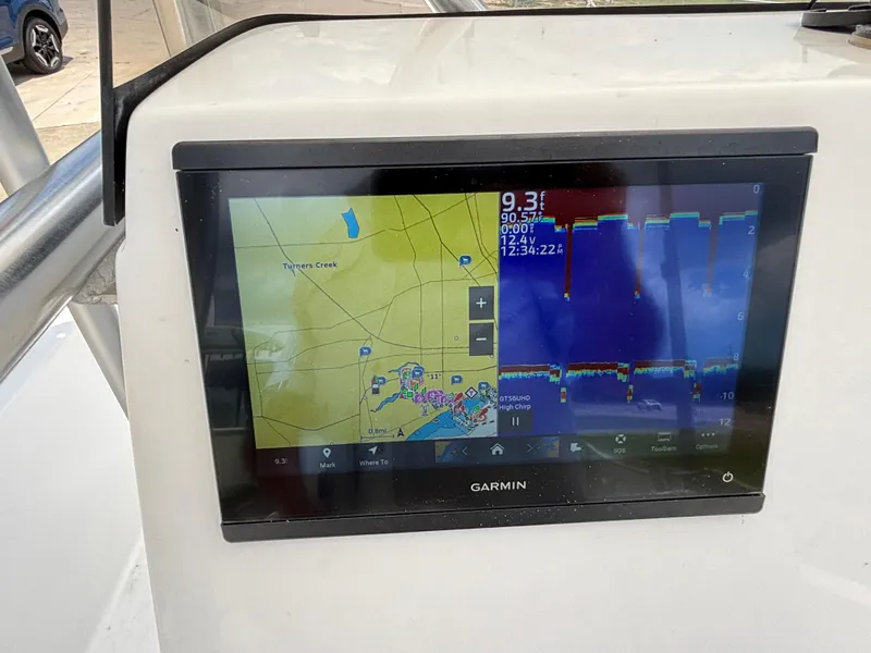 Slide: The Image of Garmin navigation display on Blazer Bay 2020 boat, showing map and sonar data. - 19