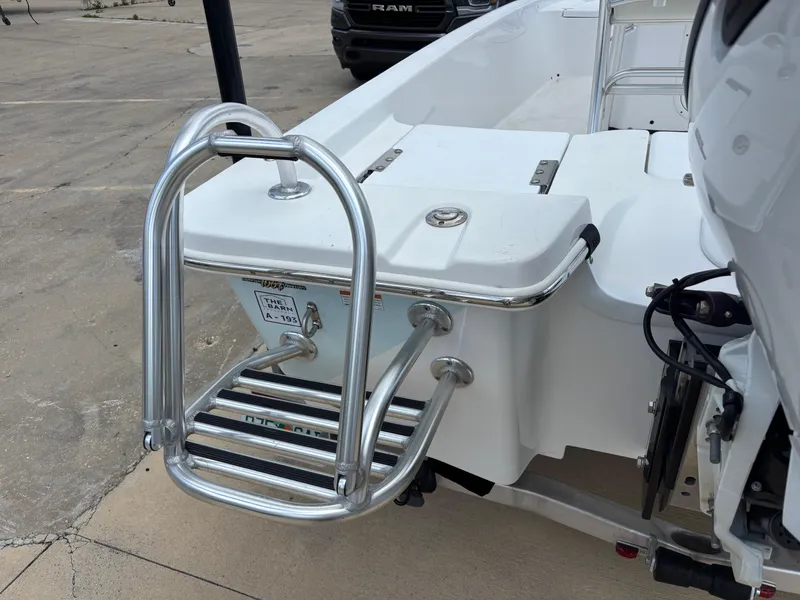 Slide: The Image of Stainless steel boat ladder on a 2023 Blazer Bay 2020, docked on concrete. - 33