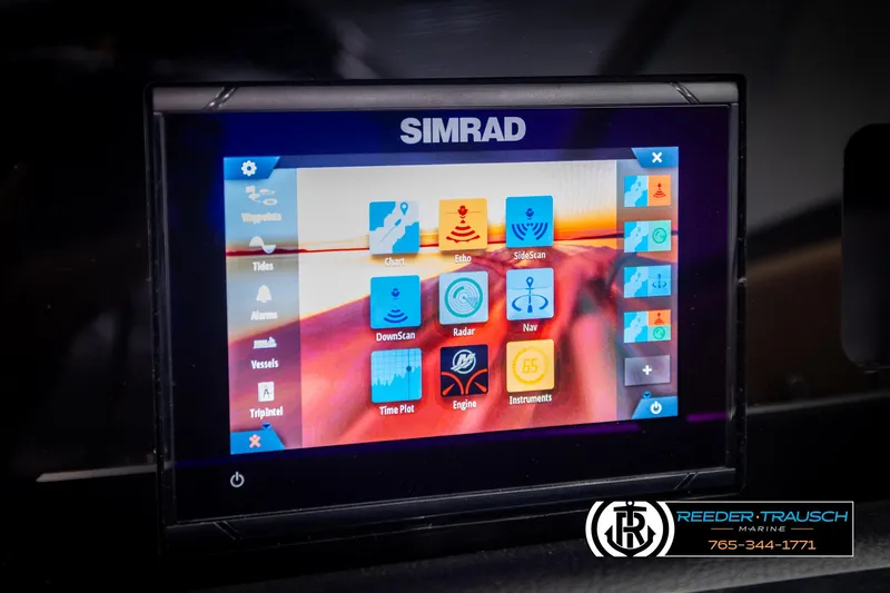 Slide: The Image of Simrad display on 2023 Four Winns H2 boat, featuring navigation and marine tools. - 36
