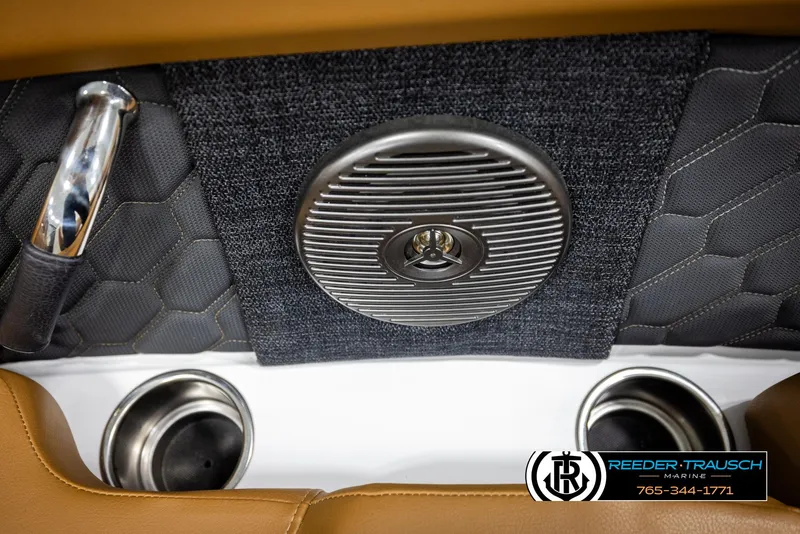 Slide: The Image of 2023 Four Winns H2 boat interior with speaker and cup holders. - 46