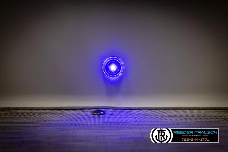 Slide: The Image of Blue LED light on 2023 Four Winns H2 boat interior, Reeder-Trausch Marine branding. - 47