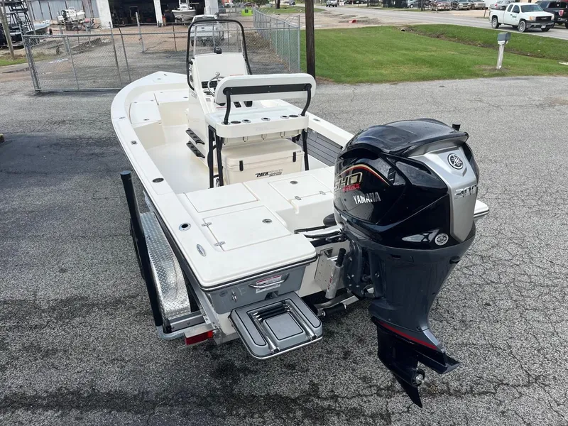 Slide: The Image of 2024 Pathfinder 2200 TRS boat with Yamaha outboard motor on a trailer. - 3