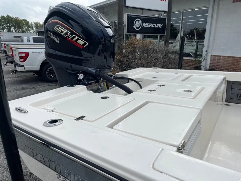 Slide: The Image of 2024 Pathfinder 2200 TRS boat with Yamaha SHO engine at dealership. - 8