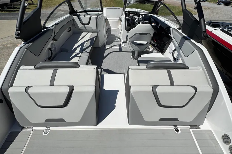 Slide: The Image of 2025 Yamaha Boats AR220 interior with modern seating and sleek design. - 2