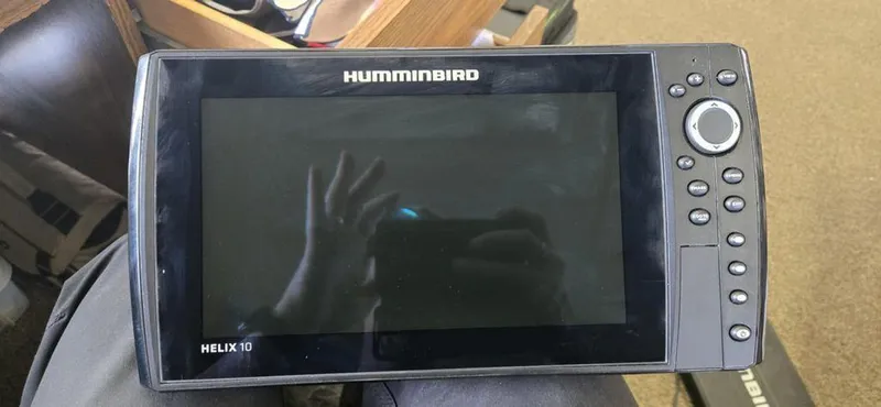 Slide: The Image of Humminbird Helix 10 fish finder on a 2008 Trophy 2152WA boat. - 1