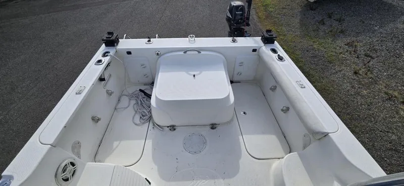 Slide: The Image of 2008 Trophy 2152WA boat interior, featuring spacious seating and storage compartments. - 10