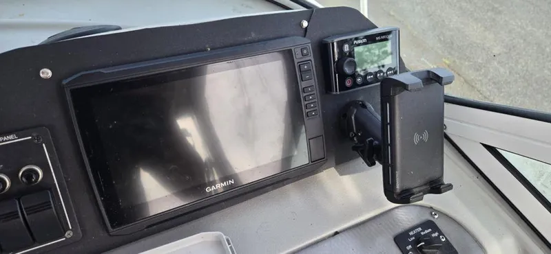 Slide: The Image of Dashboard of a 2008 Trophy 2152WA boat with Garmin navigation system. - 2
