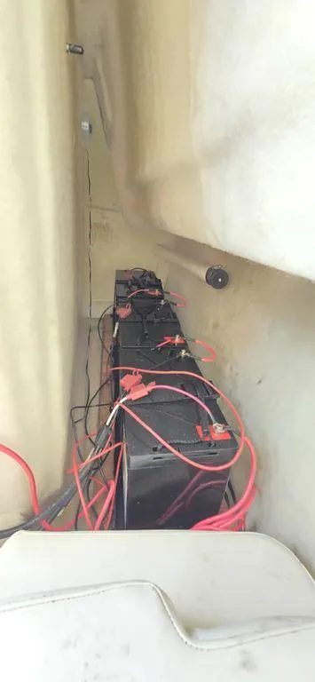 Slide: The Image of 2008 Trophy 2152WA boat battery compartment with wiring. - 3