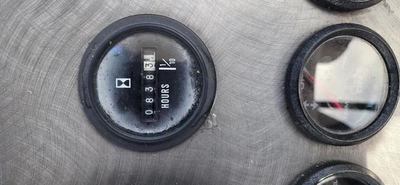 Slide: The Image of Close-up of a 2008 Trophy 2152WA hour meter displaying 836.1 hours. - 6