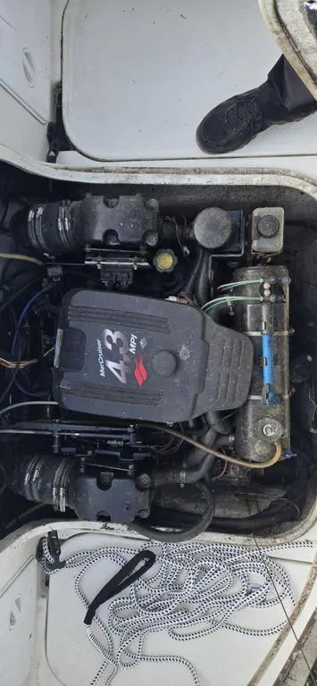 Slide: The Image of 2008 Trophy 2152WA boat engine compartment with 4.3L MerCruiser engine. - 9