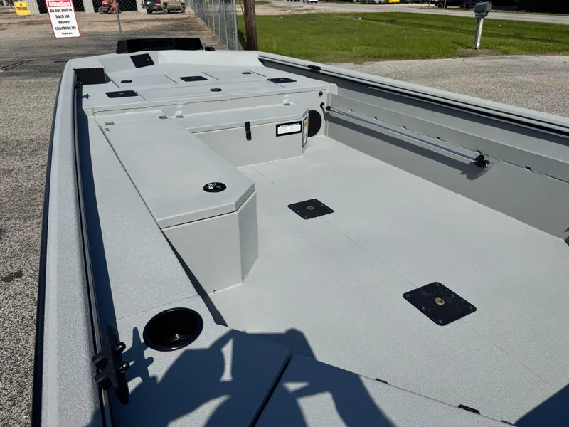 Slide: The Image of 2025 Avid 18 Commander boat interior with spacious deck and storage compartments. - 12