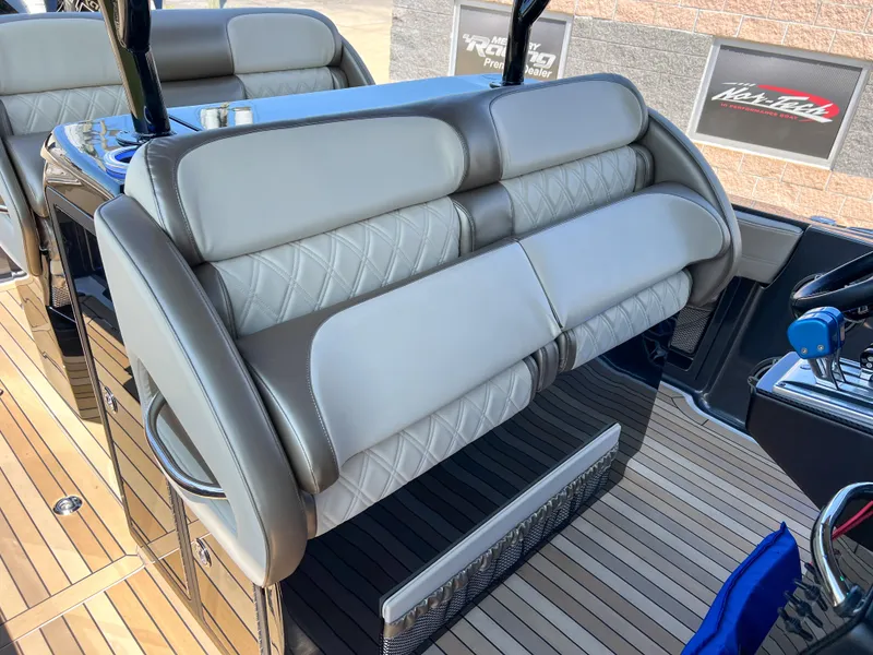 Slide: The Image of 2022 Nor-Tech 390 Sport boat interior with luxurious seating and modern design. - 15