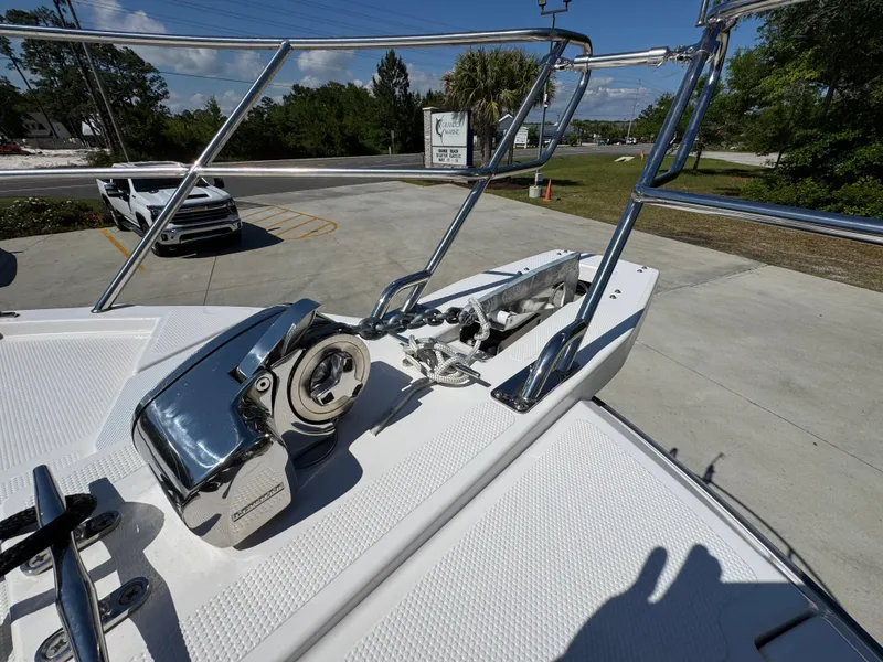 Slide: The Image of 2024 Cutwater C-288 Coupe boat deck with anchor system and railing. - 24