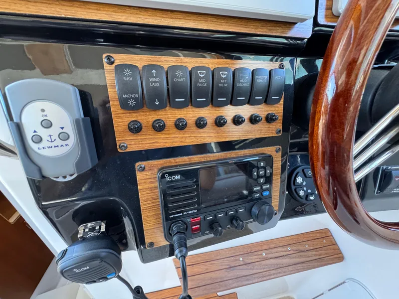 Slide: The Image of 2024 Cutwater C-288 Coupe dashboard with control panel and steering wheel. - 35