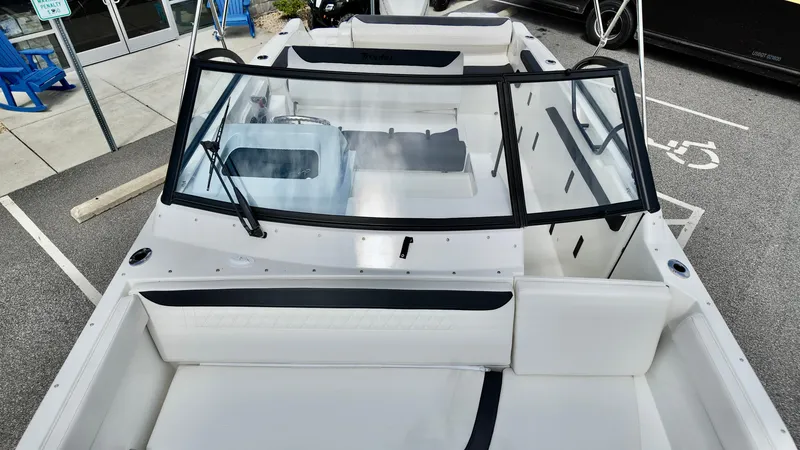Slide: The Image of 2025 Bayliner Trophy 22 Side Console boat with sleek design and spacious seating. - 18
