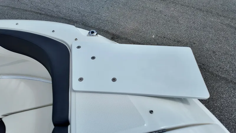 Slide: The Image of 2025 Bayliner Trophy 22 Side Console boat detail, featuring sleek seating and deck design. - 19