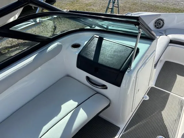 Slide: The Image of 2014 Yamaha Boats AR192 interior with seating and dashboard, featuring sleek design and modern amenities. - 12