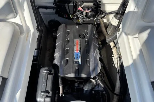 Slide: The Image of 2014 Yamaha Boats AR192 engine compartment, showcasing a clean and well-maintained motor. - 17