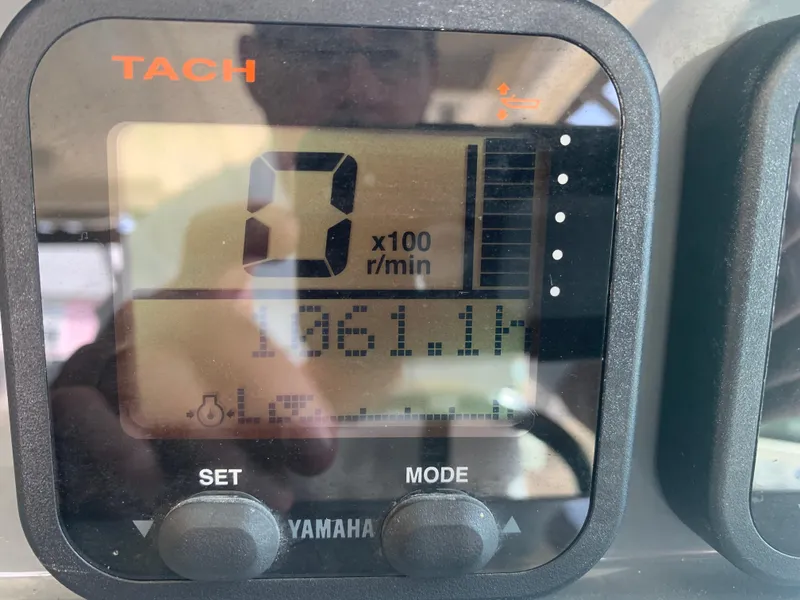 Slide: The Image of Yamaha tachometer display on 2008 Pursuit 315 OS boat showing 861.1 hours. - 10